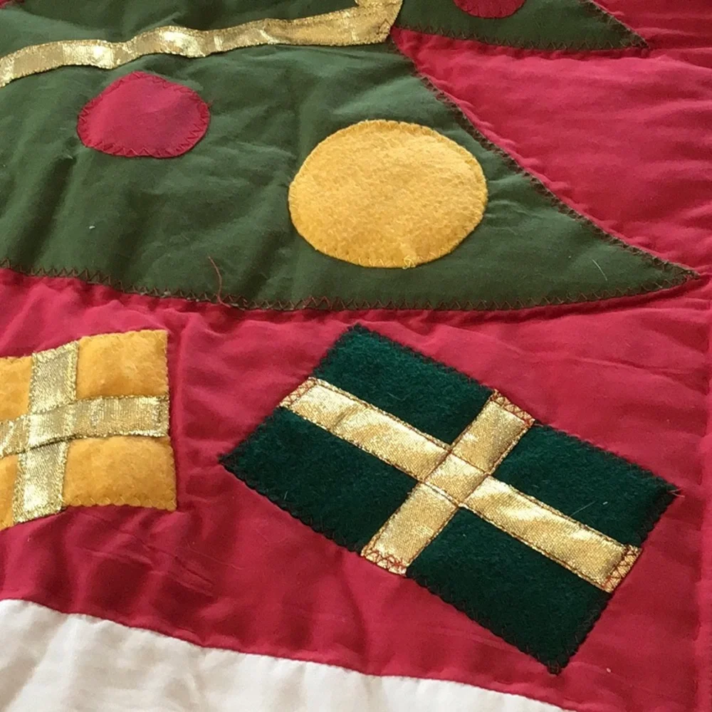 Handmade Christmas-themed applique quilt